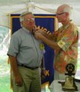 Jack Moran being pinned by President Jeff